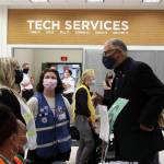 Gov. Inslee (right) meets with Auburn Vaccine Clinic staff members (left) on Tuesday, June 22, 2021. Inslee visited the clinic to promote vaccinations in lower King County. Photo by Henry Stewart-Wood/Auburn Reporter