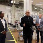 Gov. Inslee (center) gives speech on the importance of getting vaccinated and to spread awareness of the state's efforts to vaccinate all Washingtonians during his visit to the Auburn vaccine clinic on Tuesday, June 22, 2021. Photo by Henry Stewart-Wood.