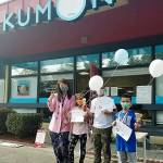 Sara Oh, left, stands with three spelling bee contestants. Courtesy photo