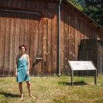 Artist in residence Neely Goniodsky poses for a photo outside of the barn she is working out of at Mary Olson Farm on Friday, June 25, 2021. The farm is located at 28728 Green River Road. Photo By Henry Stewart-Wood/Auburn Reporter