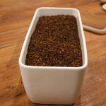 A sample of the soil Return Home creates. This sample was created using a pig carcass in their Auburn facility. Photo by Henry Stewart-Wood/Sound Publishing