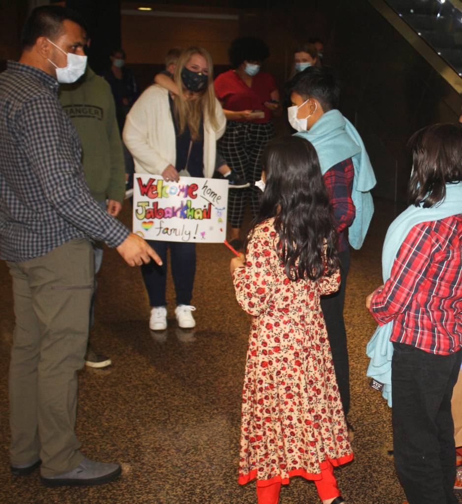 It was a welcome home gathering Oct. 1 at Sea-Tac Airport for Azizulla Jabarkhails children and wife after they were finally able to evacuate Afghanistan, a month after U.S. troops left the country. STEVE HUNTER, Kent Reporter