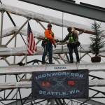 Iron workers from Ironworkers Local 82, Seattle, set the last beam on the rebuild of Chinook Elementary School. Vicki Alonzo, Auburn School District.
