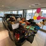 Photo of a truck at Valley Buick GMC full of goods donated to the Auburn Public Schools Foundation. Photo courtesy of Auburn Public Schools Foundation