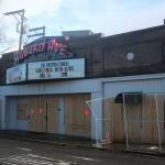 The Auburn Avenue Theater sits vacant and boarded up on Jan. 3, 2022, after being condemned due to safety concerns stemming from the demolition of the Max House Apartments complex next door. Photo by Henry Stewart-Wood/Sound Publishing