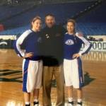 Aly Carr (left) and Cait Carr (right) with their father, Chris Carr. (Photo courtesy of Marla Carr)