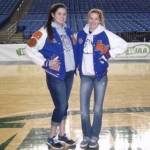 Cait Carr, left, and Aly (Carr) Lacey pose for a photo in their varsity jackets. The sisters played together at Auburn Mountainview High School, but now coach girls basketball at Auburn Mountainview and Kentlake High School, respectively. COURTESY PHOTO, Marla Carr