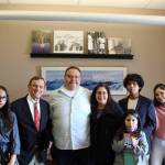 John Daniels Jr. and his family pose for a photo with King County Councilmember Pete von Reichbauer. Photo courtesy of Pete von Reichbauers office