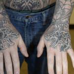 Photo of Auburn Police officer Jeffrey Nelsons tattoos. A King County Superior Court Judge decided many of Nelsons tattoos contained wording or imaging that would prejudice potential jurors. An additional 40 images have to be redacted prior to being released. (Courtesy photo)