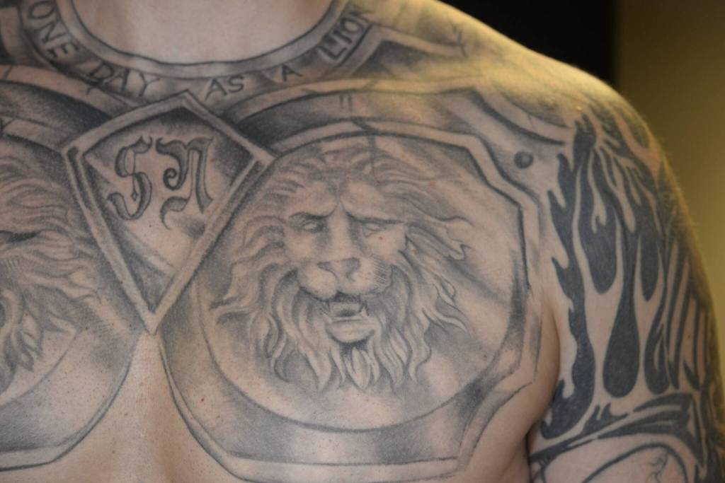 Nelson has a partial quote from Fascist dictator Benito Mussolini tattooed around his neck. The full quote reads It is better to live one day as a lion than 100 years as a sheep. Courtesy photo