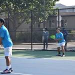 Auburn Riversides Cegielski twins (Daniel and Matthew) in their opening match at Auburn High School. Photo by Ben Ray/Sound Publishing