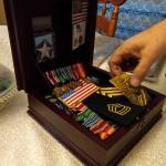 Chriss Moens medals from his service in the U.S. Army. Photo by Robert Whale/Auburn Reporter