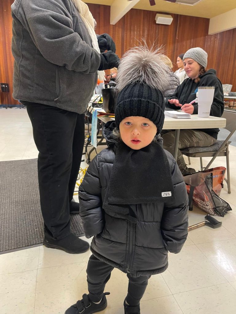 A girl named Nichole at the Auburn Food Bank. Photo by Carol Greiling/Auburn Reporter