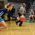 Ravens junior Avery Moore leads Auburn Riverside down the floor. Photo by Ben Ray/Sound Publishing