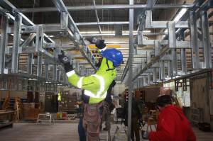 Martinze Johnson takes part in a training program at the Northwest Carpenters Institute of Washington center in Kent. STEVE HUNTER, Sound Publishing