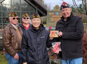 COURTESY PHOTO, VFW Post 6785
From left to right, Alan BHymer, USAF Korea Defennse veteran; Richard Klug, USAF Vietnam War veteran; and Walt Tanimoto, US Army Iraq War veteran, honor Richard Sample, US Army Korea Defense veteran, with three awards.