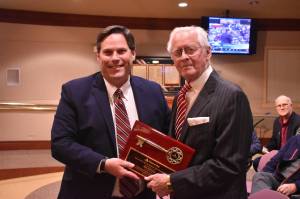 Alex Bruell/The Mirror
Mayor Jim Ferrell, left, presents Bob Roegner with a Key to the City on Jan. 4.