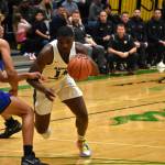 Auburns Luvens Valcin driving to the hoop. Photos by Ben Ray/Auburn Reporter