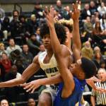 Sophomore Jaylen Petty absorbs the contact on his way to the bucket. Photos by Ben Ray/Auburn Reporter