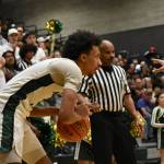 Senior Semaj Brown scopes out the defense against ODea. Ben Ray / The Reporter