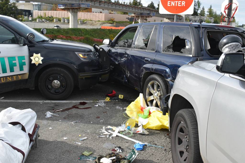 Cicero Sanchezs autopsy report shows evidence of medical intervention performed at the scene including wound dressing, thoracostomy tubes, intubation, defibrillator pads and the administration of an intravascular catheter. Multiple windows on Sanchezs vehicle appear partially and fully broken. (Photo courtesy of Cristy Sanchez)