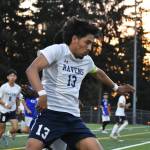 Raven senior Emilio Calvario battles a Royal defender. Ben Ray / The Reporter