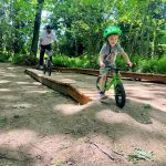 A small boy samples a portion of the bike trail at Cedar Lanes Park in south Auburn. (Photo courtesy of Auburn Parks, Arts and Recreation)