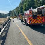 Officials temporarily shut down SR 18, west of SR 167, to traffic as a result of the brush fire. (Courtesy of the Renton Regional Fire Authority.)