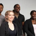 From left to right: mentor Ron Howell, resource navigator Adriane Karg, executive director DeVonte Parson and COO Kechi Amaefule pose for a photo at the Pro Se Potential office in Federal Way. (Photo by Alex Bruell / Sound Publishing)