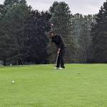 Esther Yu practices the short game at Auburn Golf Course.