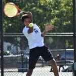 Solomon Smith hits a forehand in the lone win against Thomas Jefferson. Ben Ray / The Reporter