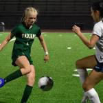 Auburns Brynn Casperson tries to avoid a Gator defender. Ben Ray / The Reporter