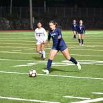 Ellie Shipe plays the space against the Conks for Riverside. Ben Ray / The Reporter