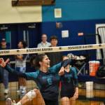 Raven senior Sophie Danielson cracks a smile in the third set in the win over Kentlake. Ben Ray / The Reporter