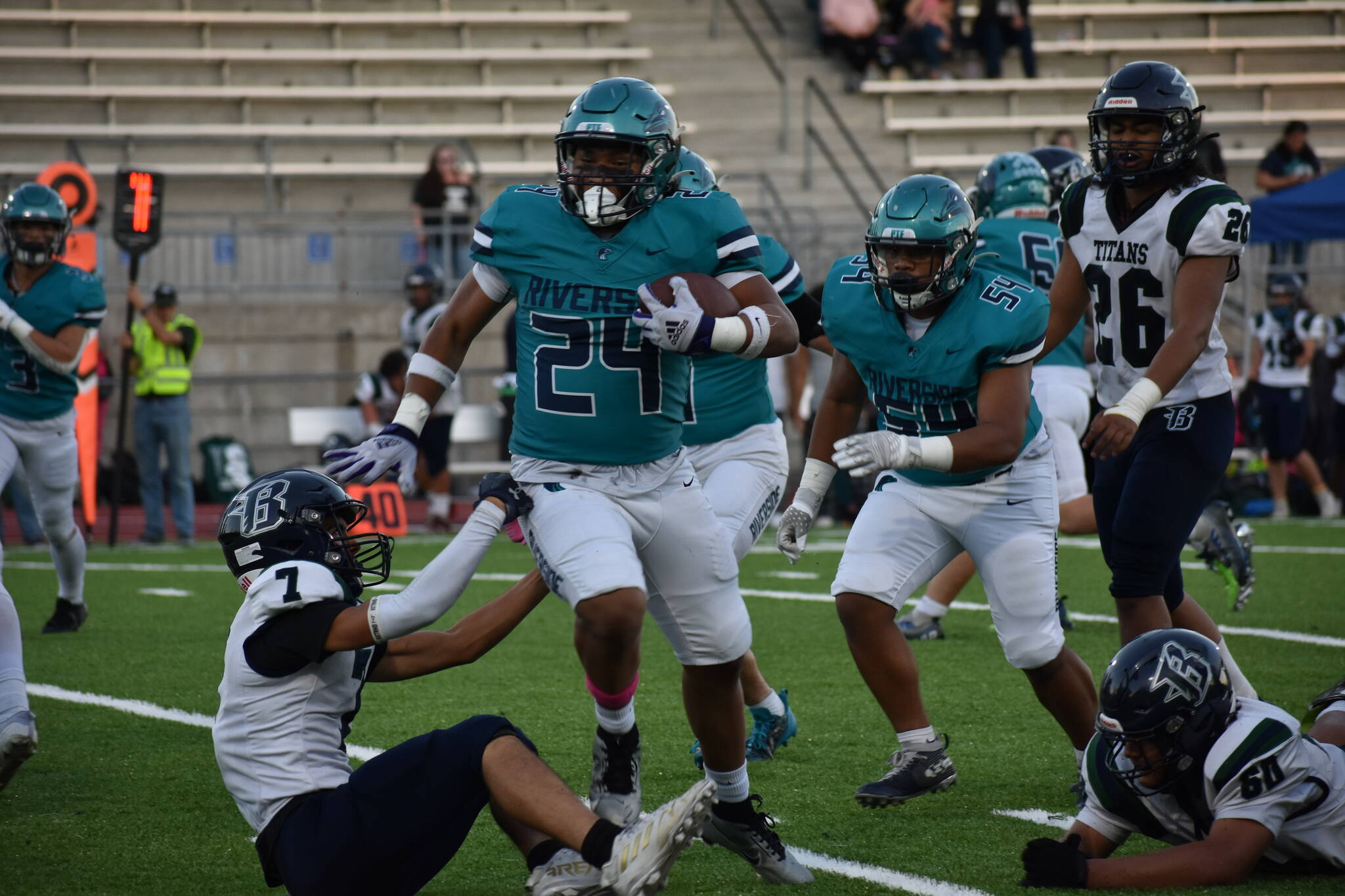 Kyree Wright runs over a Todd Beamer defender. Ben Ray / The Reporter