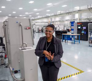 Magnificent Willis, a leader in Boeing product integration, welcomes AWBs Manufacturing Week tour group Oct. 11 to the Boeing Additive Manufacturing metals print room in Auburn. COURTESY PHOTO, Brian Mittge/Association of Washington Business