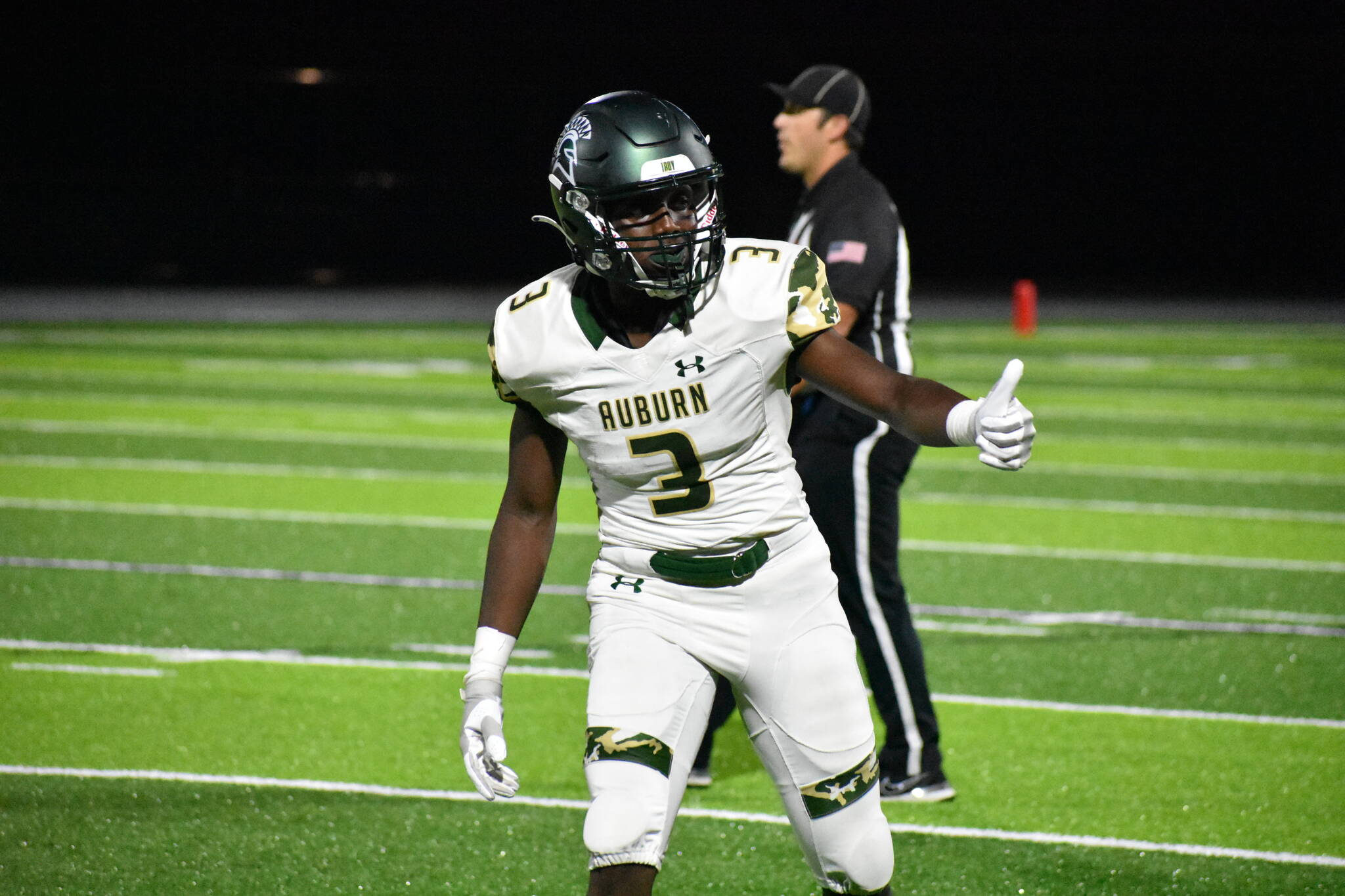 Lukens Valcin gives a thumbs up to the near-side official before a play. Ben Ray / The Reporter