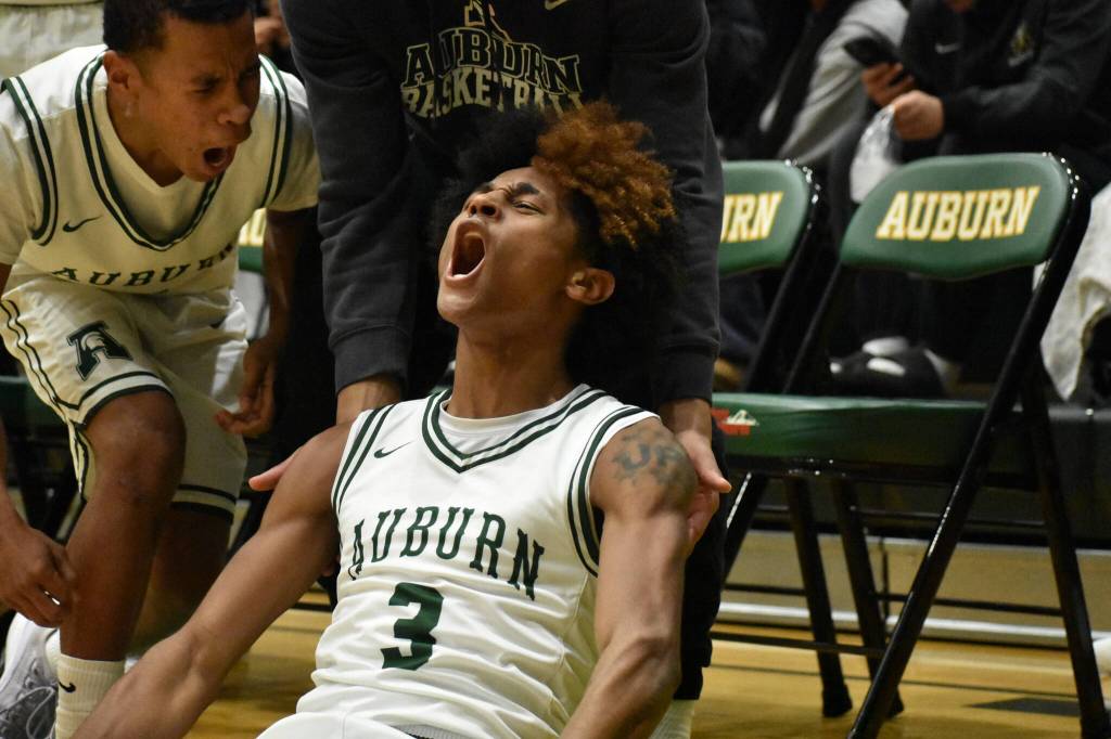Jaylen Petty lets out a yell after an and-one three point shot. Ben Ray / The Reporter