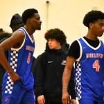 Mande Wanlemvo and Carmelo Jacobs walk back to the locker room after their season came to a close. Ben Ray / The Reporter