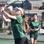 Auburn doubles player preps for a volley against Thomas Jefferson at Auburn High School. Ben Ray / The Reporter