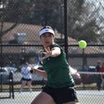 Gabriela Rebutiaco eyes down the ball as she hits a forehand against Thomas Jefferson. Ben Ray / The Reporter