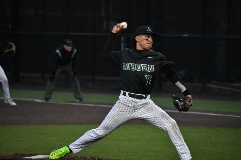 Freddy Frias pitches to the Lions at Auburn High School.