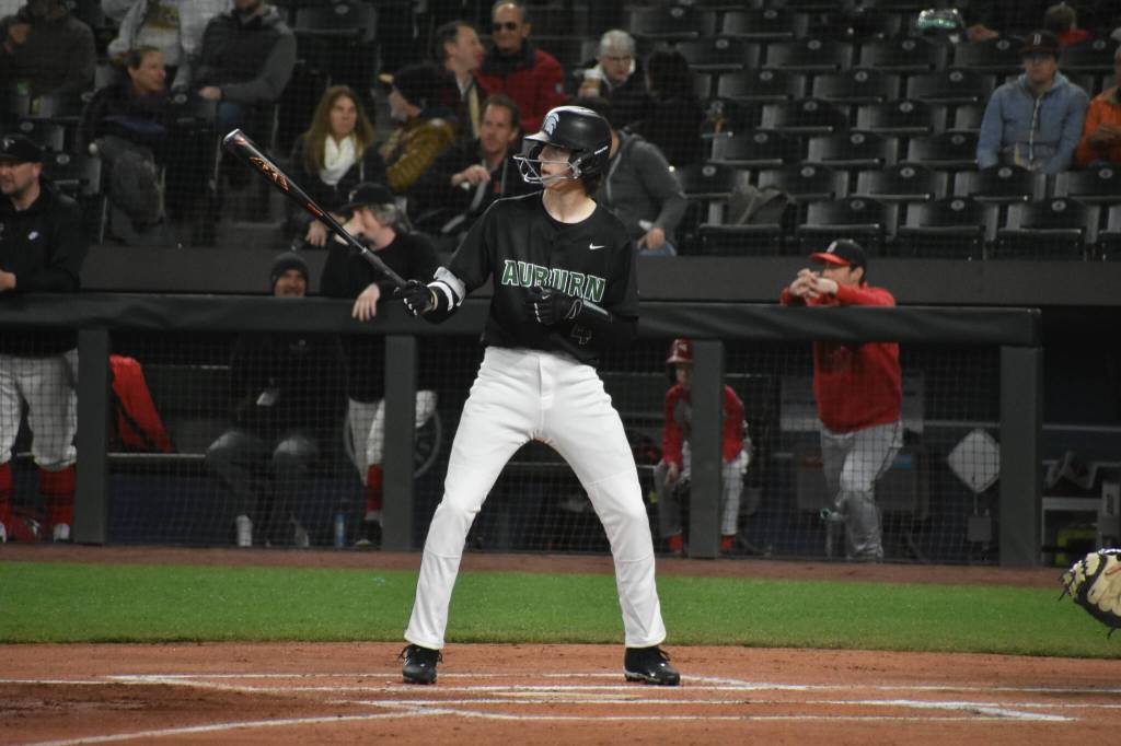 Chase Mentink sizes up the Ballard starting pitcher in the top of the first inning. Ben Ray / The Reporter