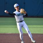 Andre Muneton makes a throw to first base. Ben Ray / The Reporter