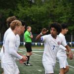 Nate Esayase gives some love to Davyd Fedina after the Lions took a 1-0 lead. Ben Ray / The Reporter