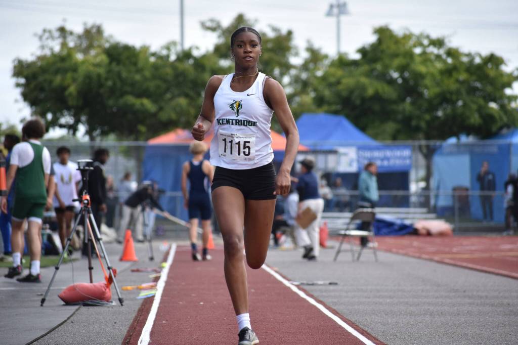 Kentridges LaJaya Brown does her run up for the long jump at state. Ben Ray / The Reporter