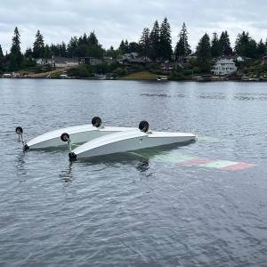 COURTESY PHOTO, Puget Sound Fire
A seaplane sits upside down after crashing Saturday, Aug. 24 in Lake Meridian.