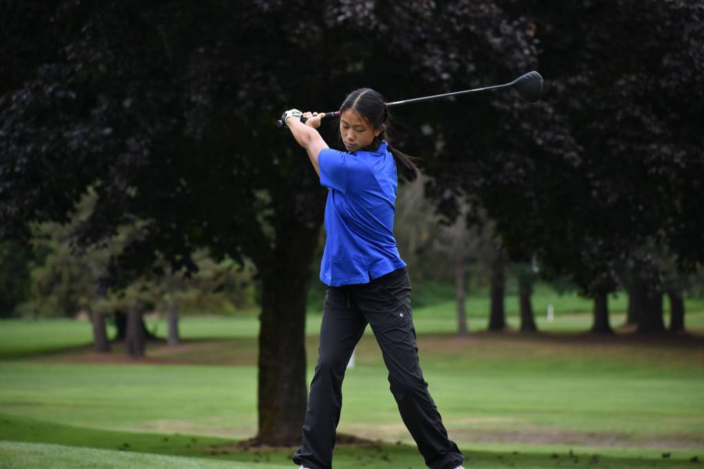 Lions sophomore Esther Yu takes her tee shot on the third hole at the Auburn Golf Course. Ben Ray / The Reporter