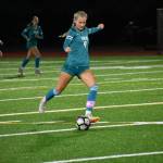Raven senior captain Caitlyn Riggs takes aim at the goal with a shot against Kentwood. Ben Ray / The Reporter