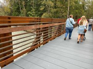 Pedestrians try out the new bridge Oct. 1 at Game Farm Park. Photos by Andy Hobbs/Auburn Reporter